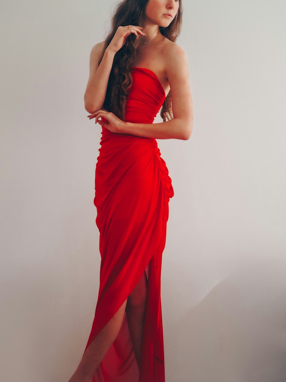 woman in red sleeveless dress