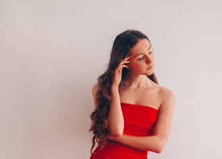 woman in red tube dress