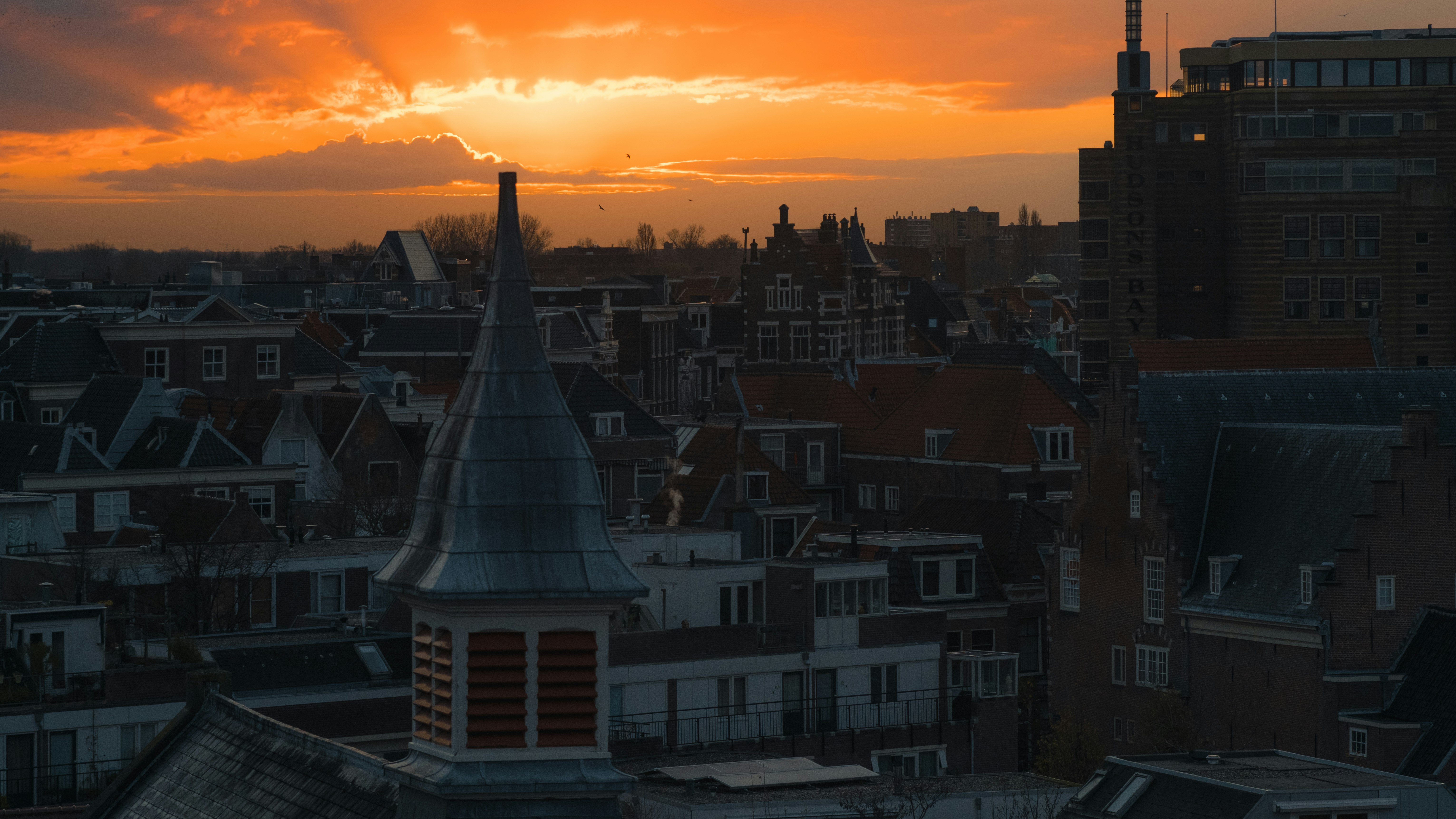 white and brown concrete building during sunset