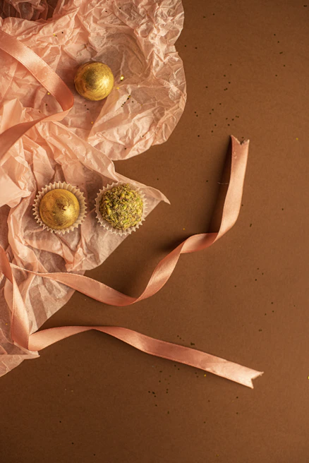 Elegant packaging of Saryu Elite dry fruits arranged on a minimalist black surface