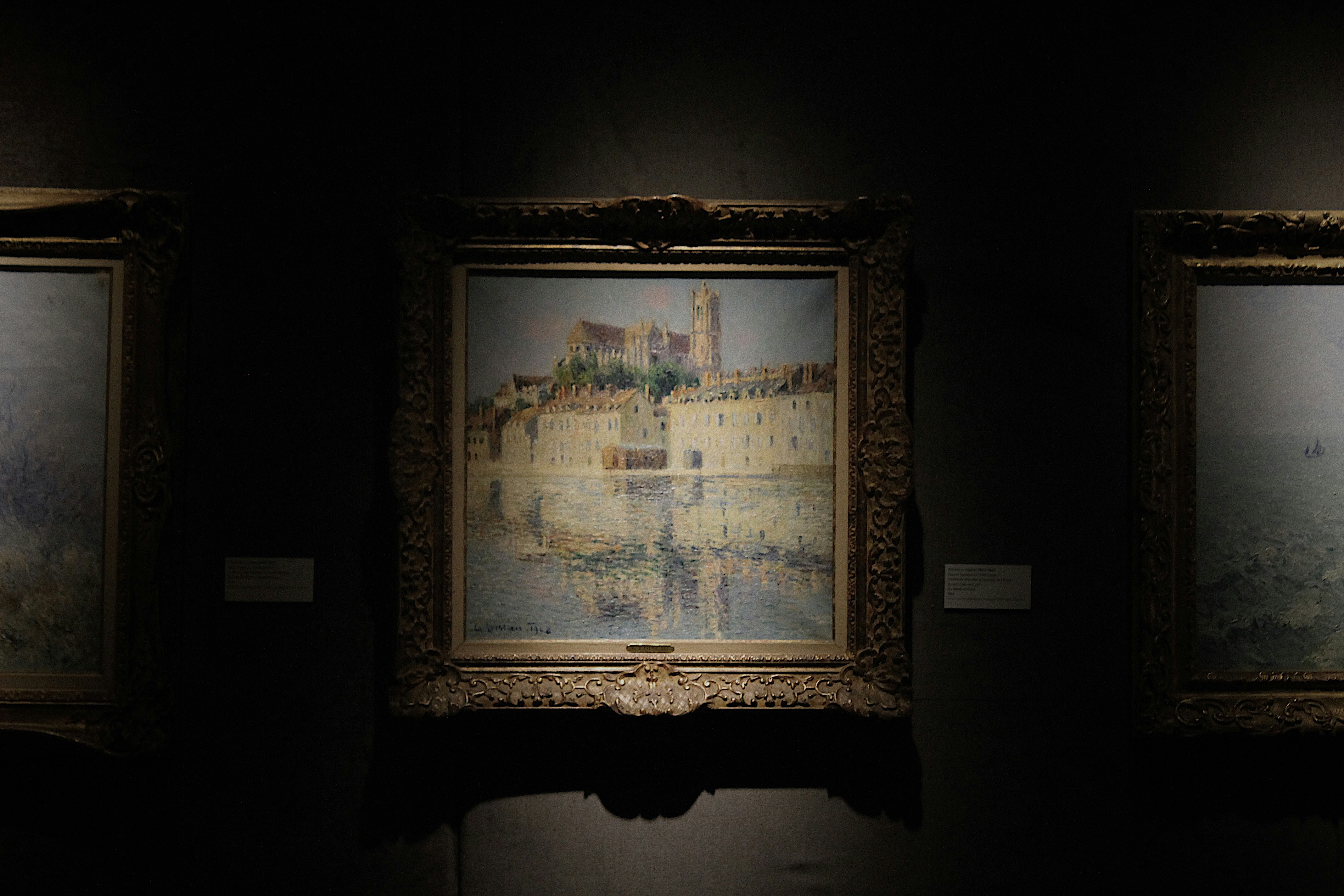 brown wooden framed painting of people walking on street