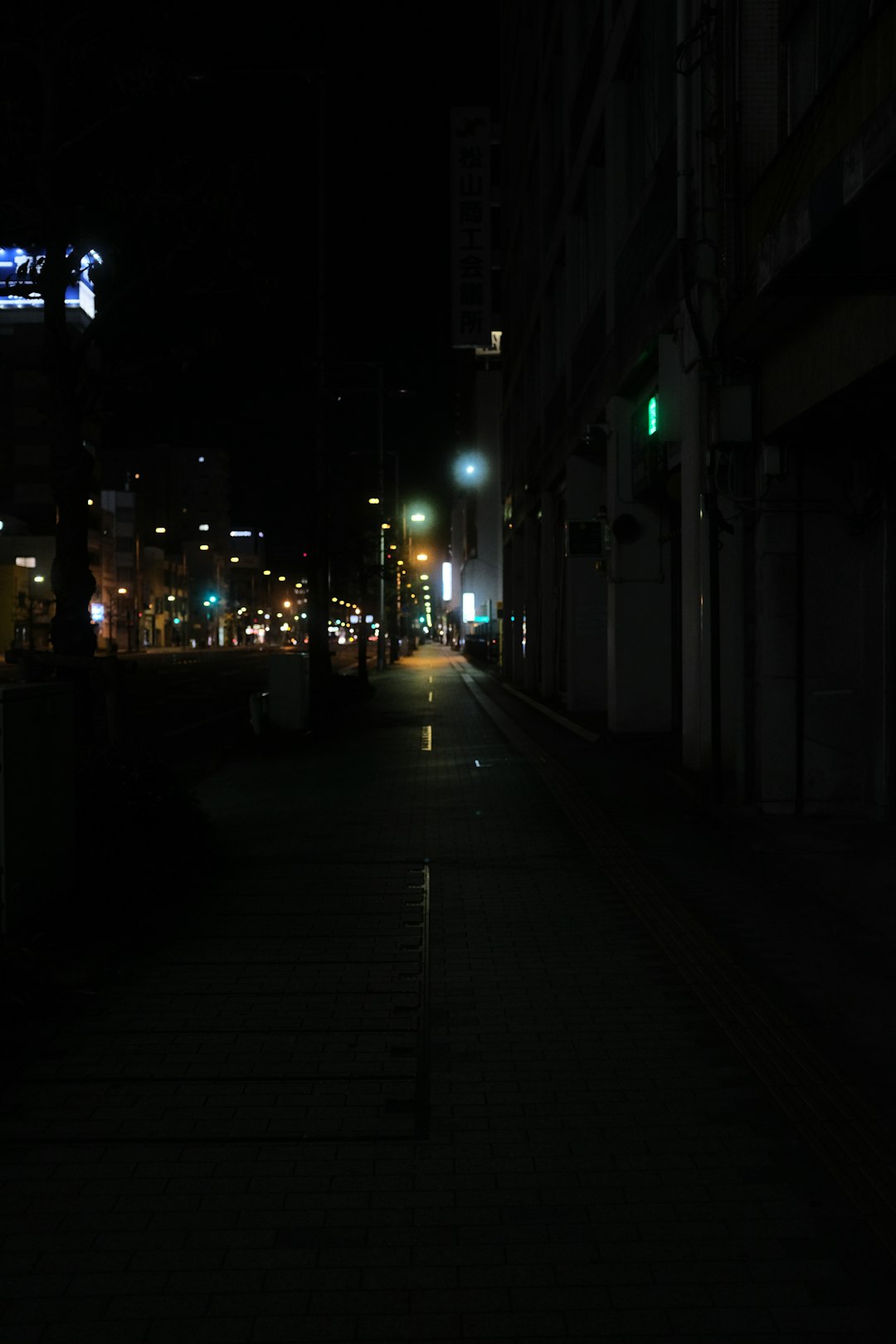 black car on road during night time