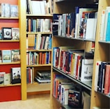 Well-stocked library corner with students reading and exploring books of all ages.
