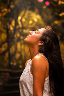 woman in white tank top