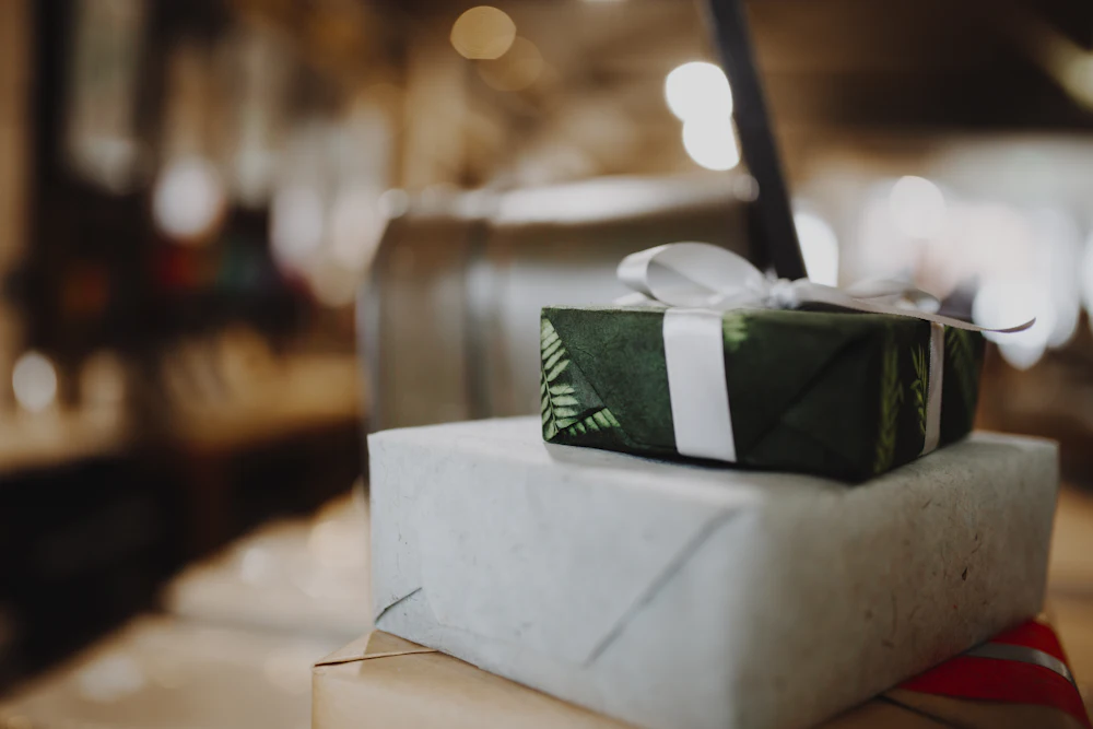 A pale gift box on a white table