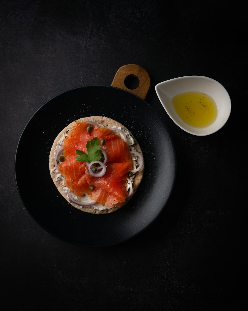 black ceramic bowl with soup