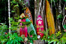 red yellow and green wooden cross