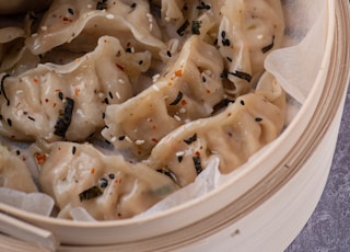 white pasta on white ceramic bowl