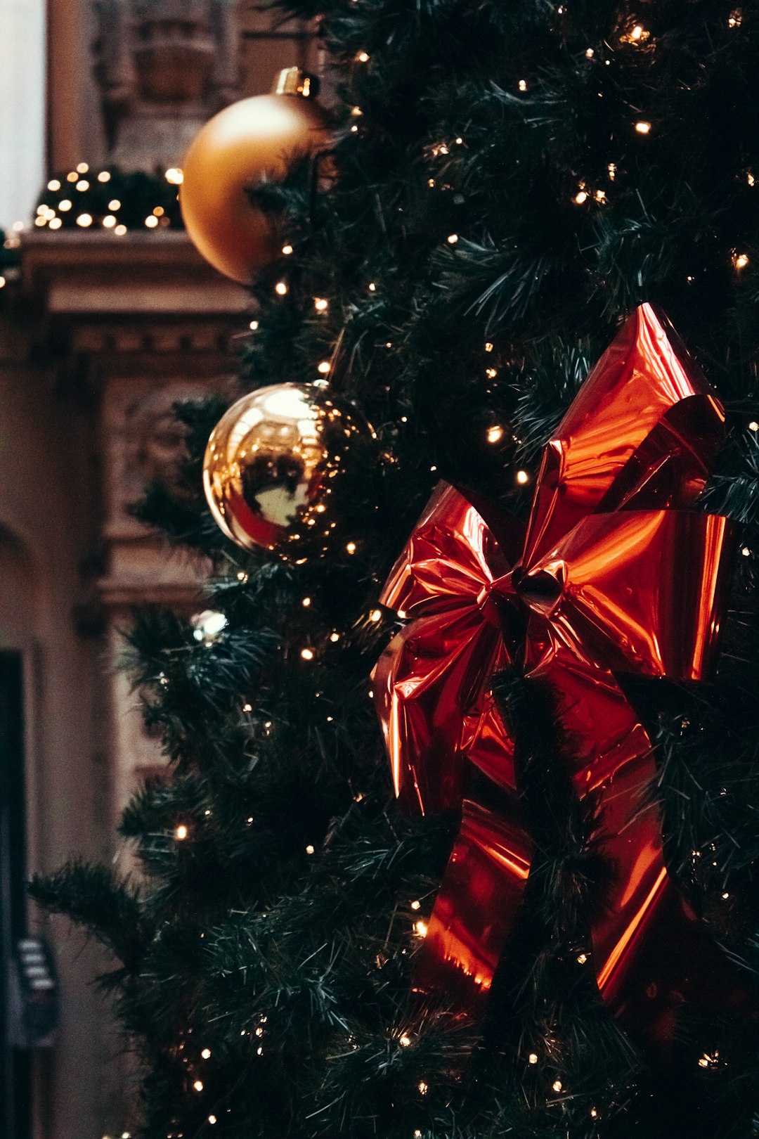 green christmas tree with red and gold baubles