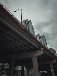 gray concrete building under white sky during daytime