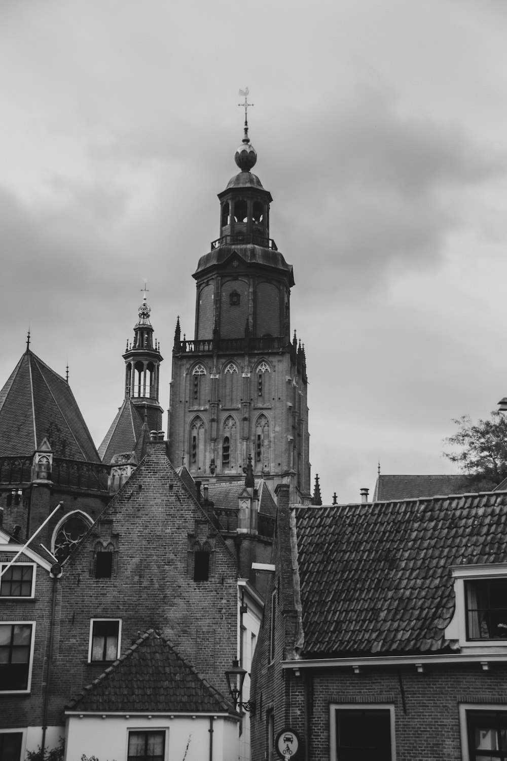 grayscale photo of brick building