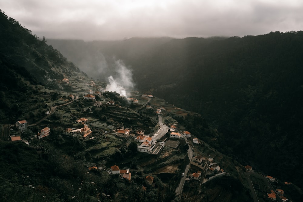 aerial view of city near mountain during daytime