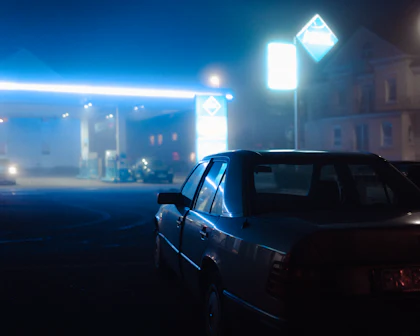 Car under neon at night