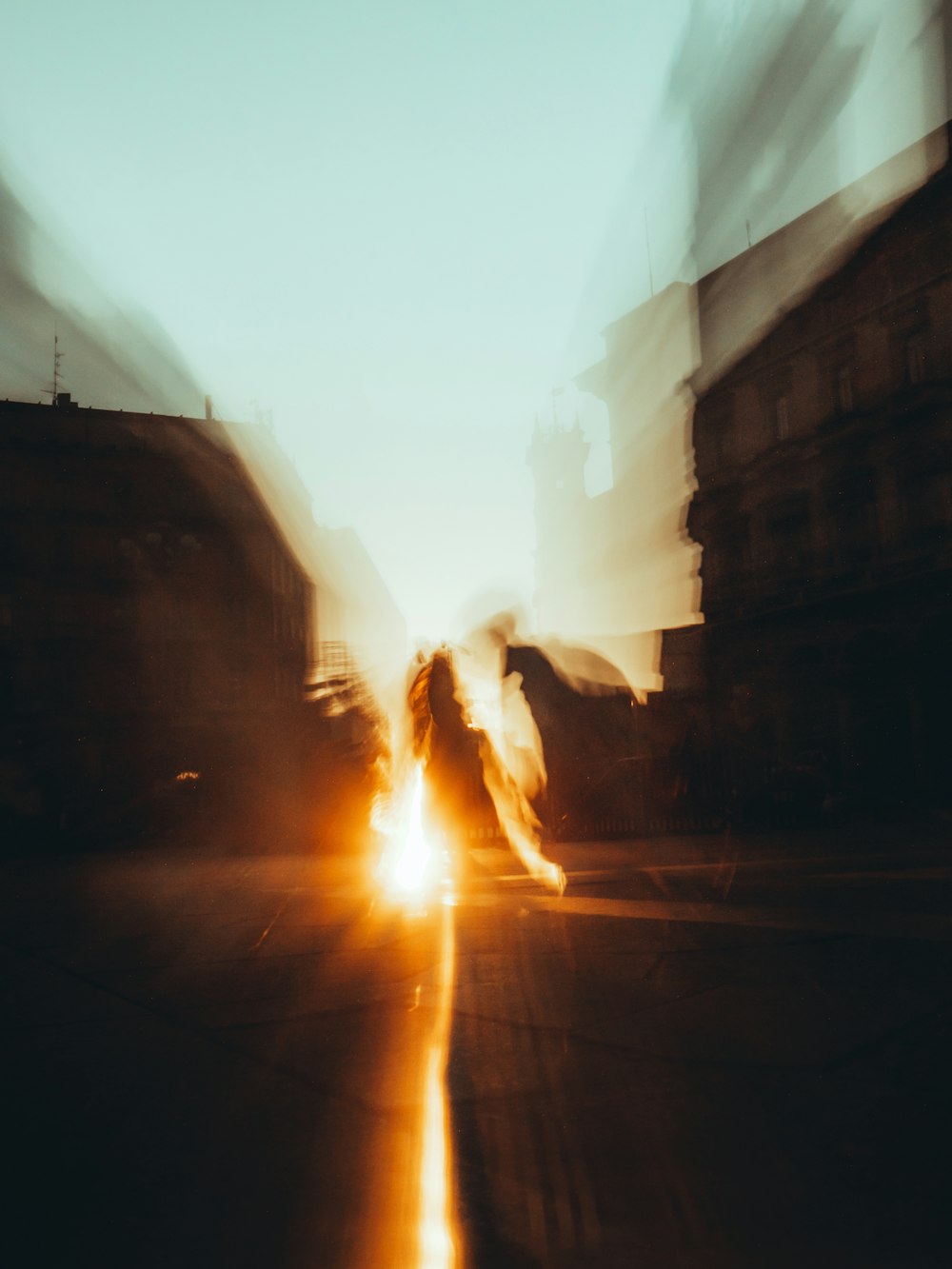 man in black jacket walking on street during daytime