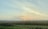 A serene sunrise over a peaceful landscape, symbolizing a fresh start to the day.