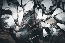 broken glass on brown sand