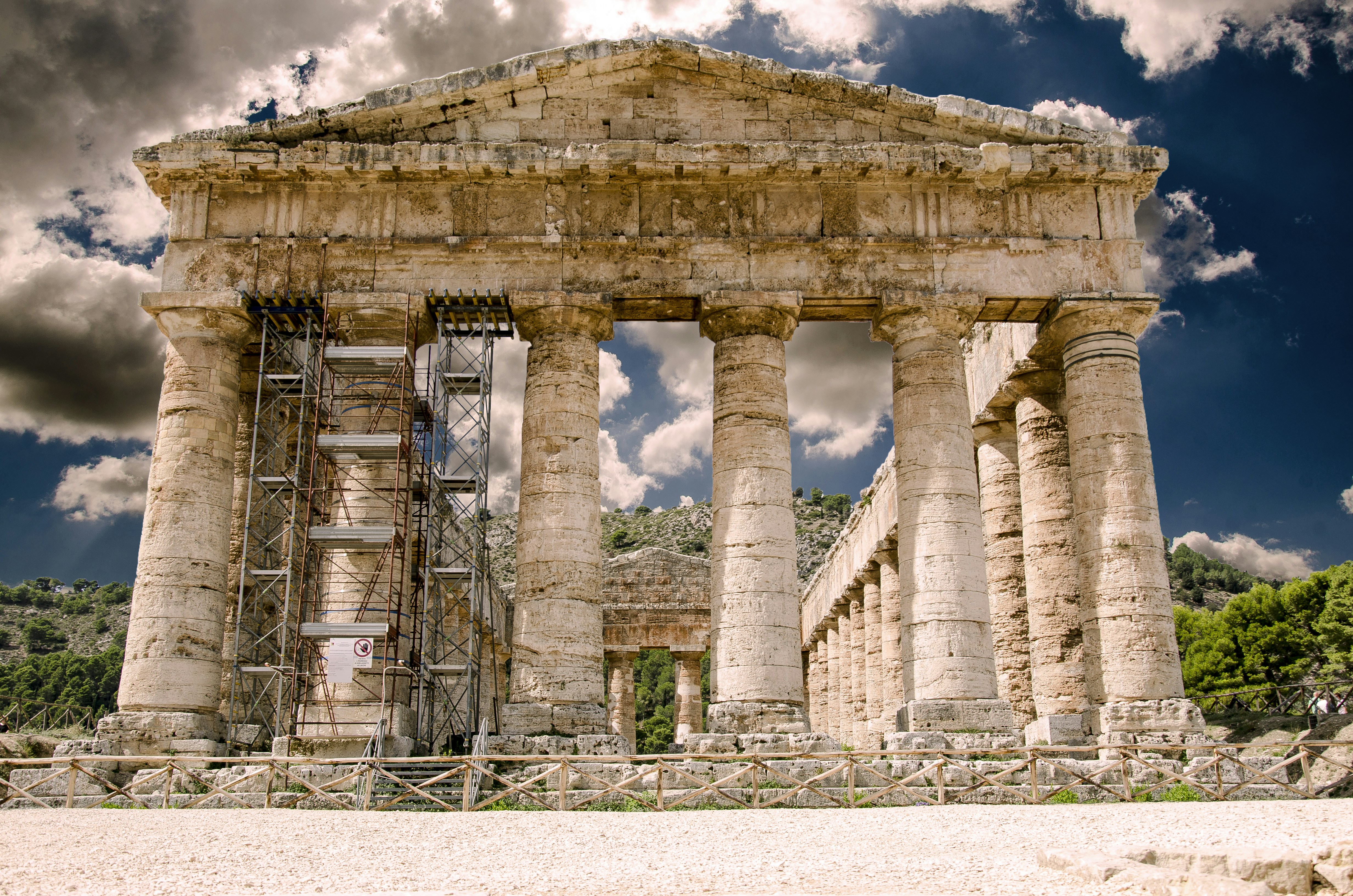 brown concrete building under blue sky during daytime