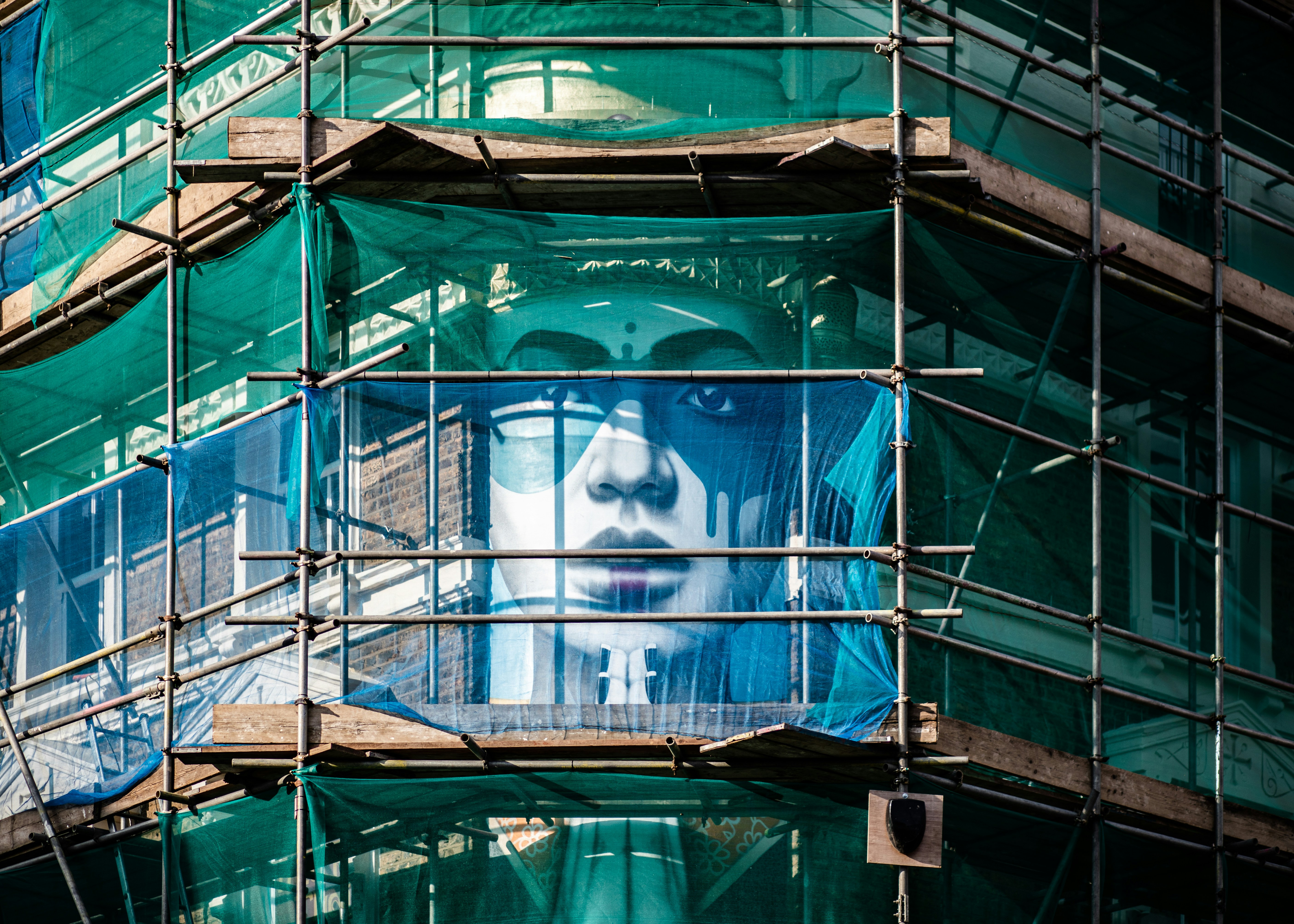 blue and white glass building, Out of sight
