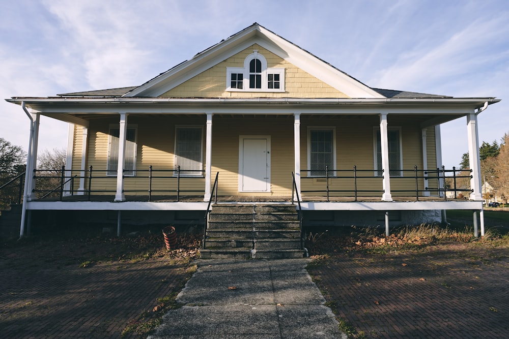 white and blue wooden house