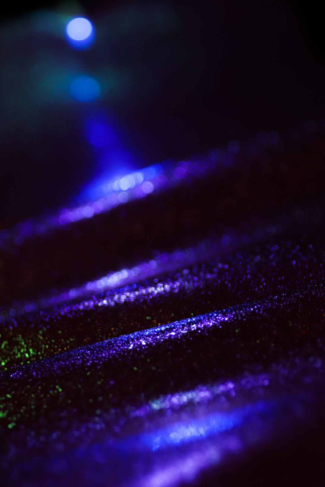 purple light in close up photography