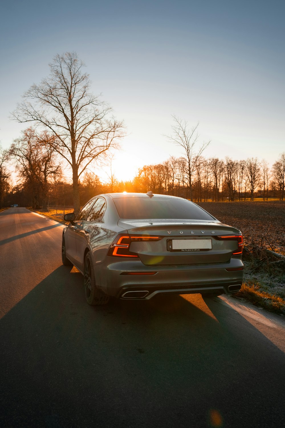 black car on road during daytime