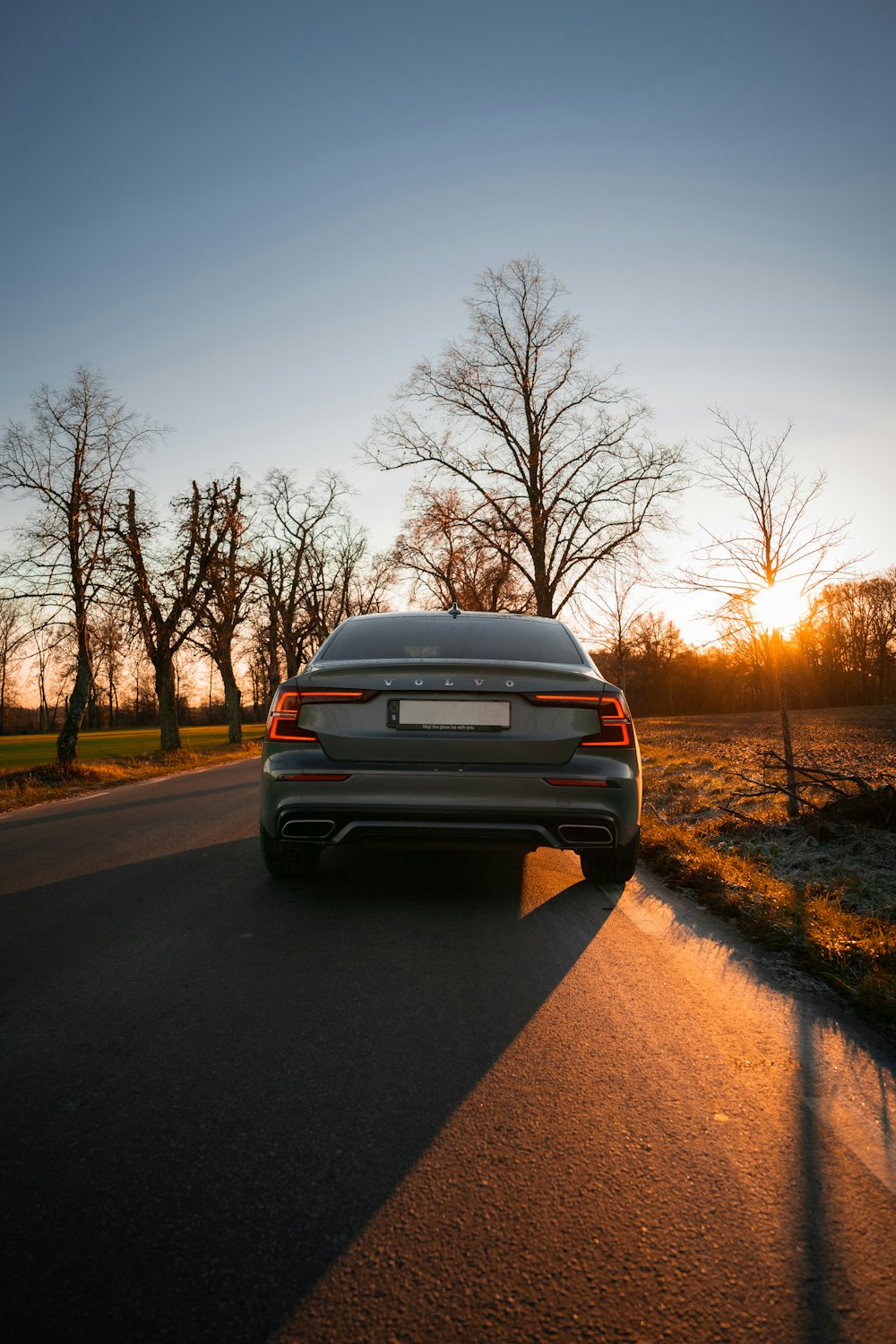 black car on road during daytime