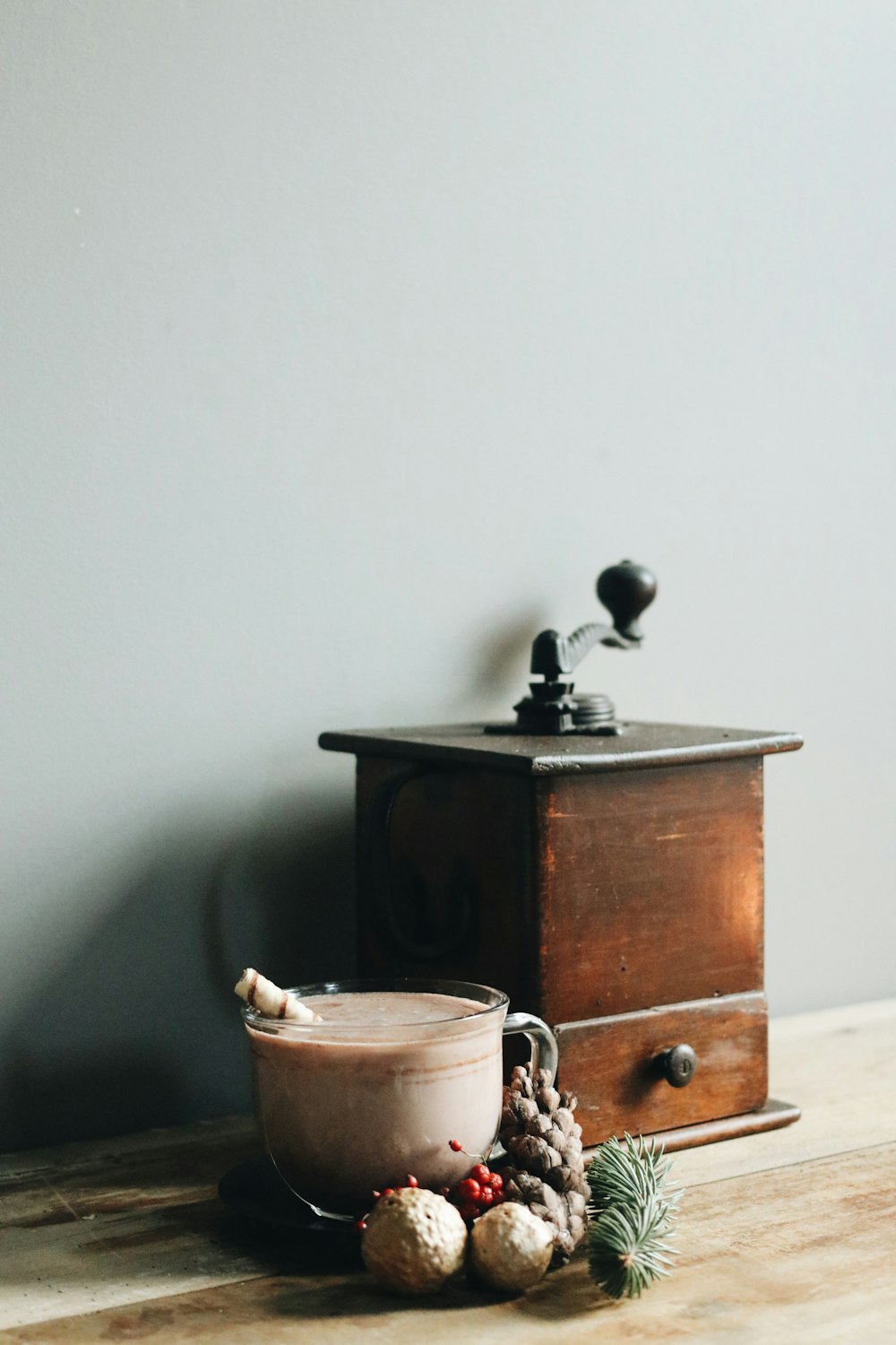 stainless steel kettle on brown wooden table