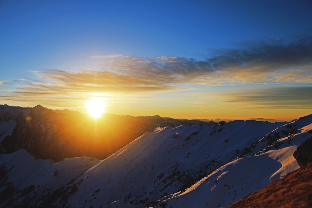 snow covered mountains during daytime