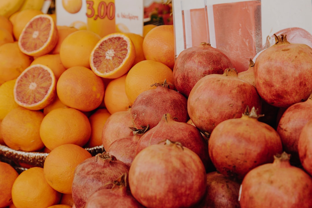 orange fruit and yellow round fruits