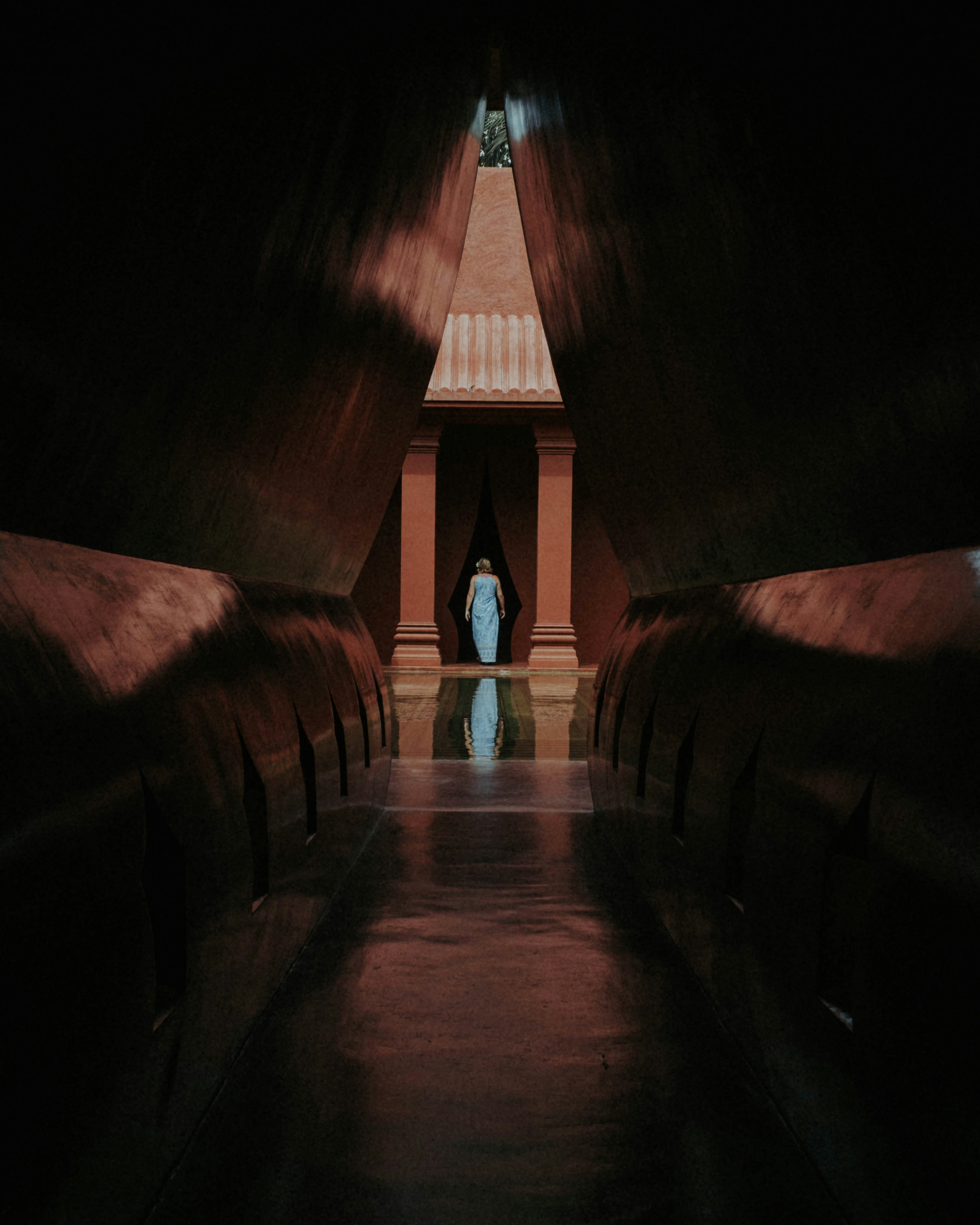 brown wooden hallway with blue and brown roof