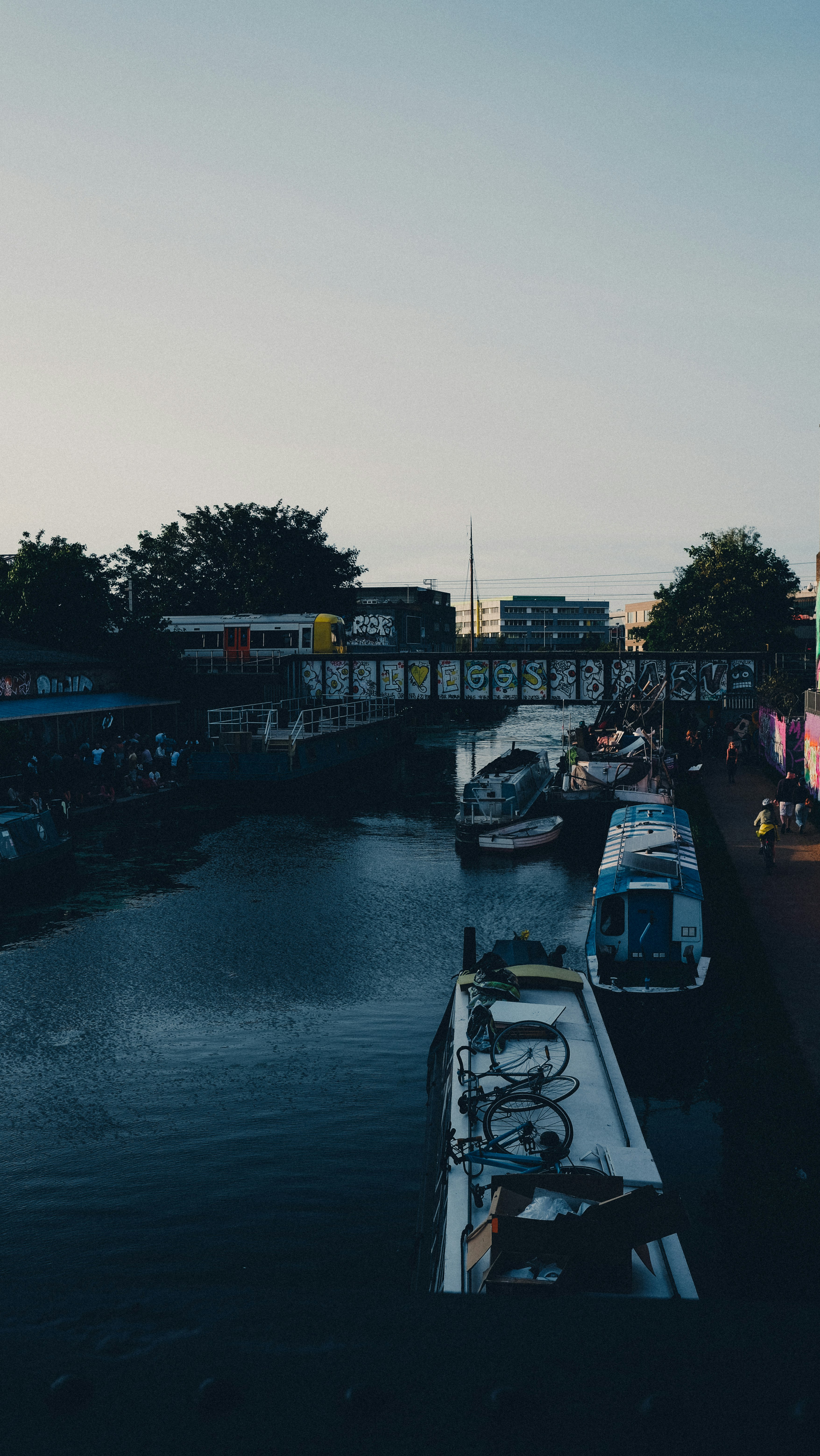 cars parked on side of the bridge during daytime