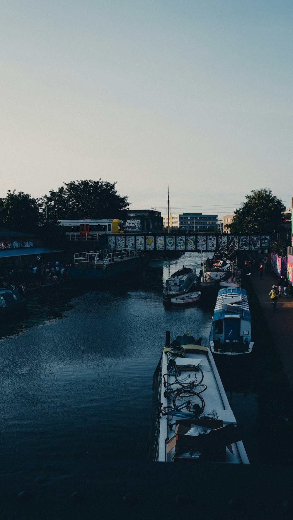 cars parked on side of the bridge during daytime