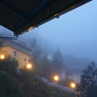 Early morning mist over the residential area emphasizing peaceful surroundings near Yamuna Expressway.