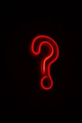 red letter b on black background