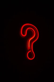 red letter b on black background