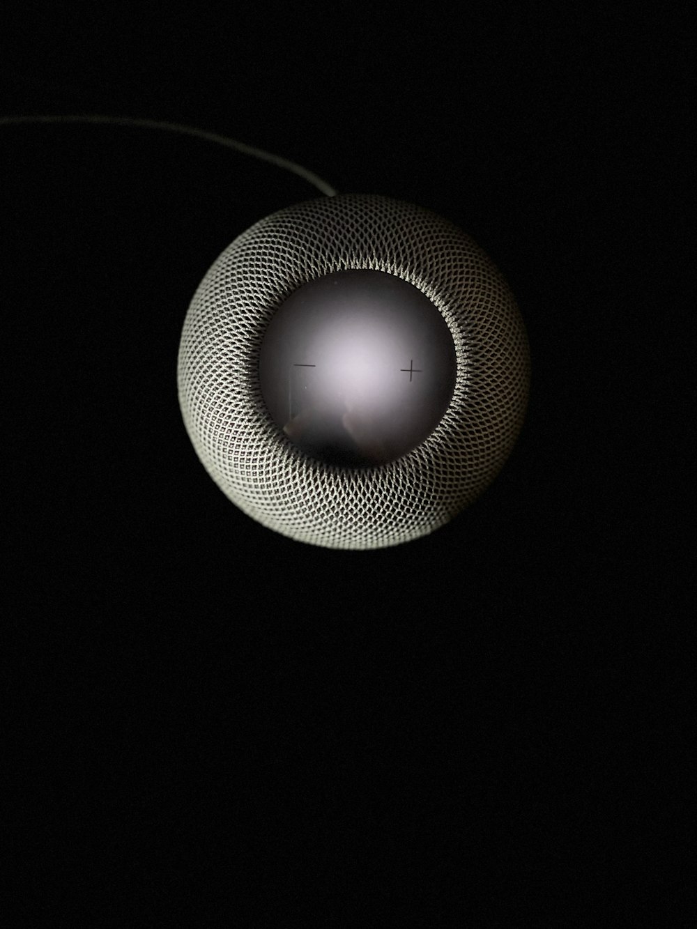round white and black portable speaker