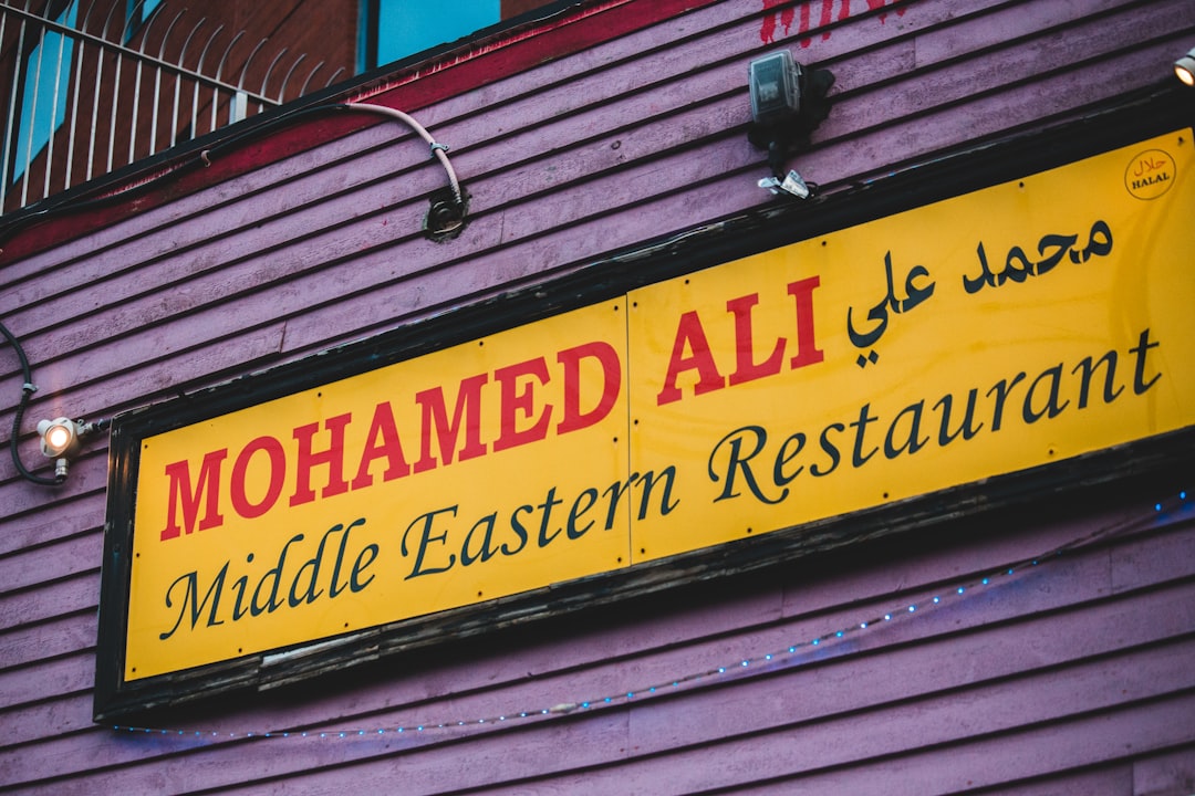 black and yellow wooden signage