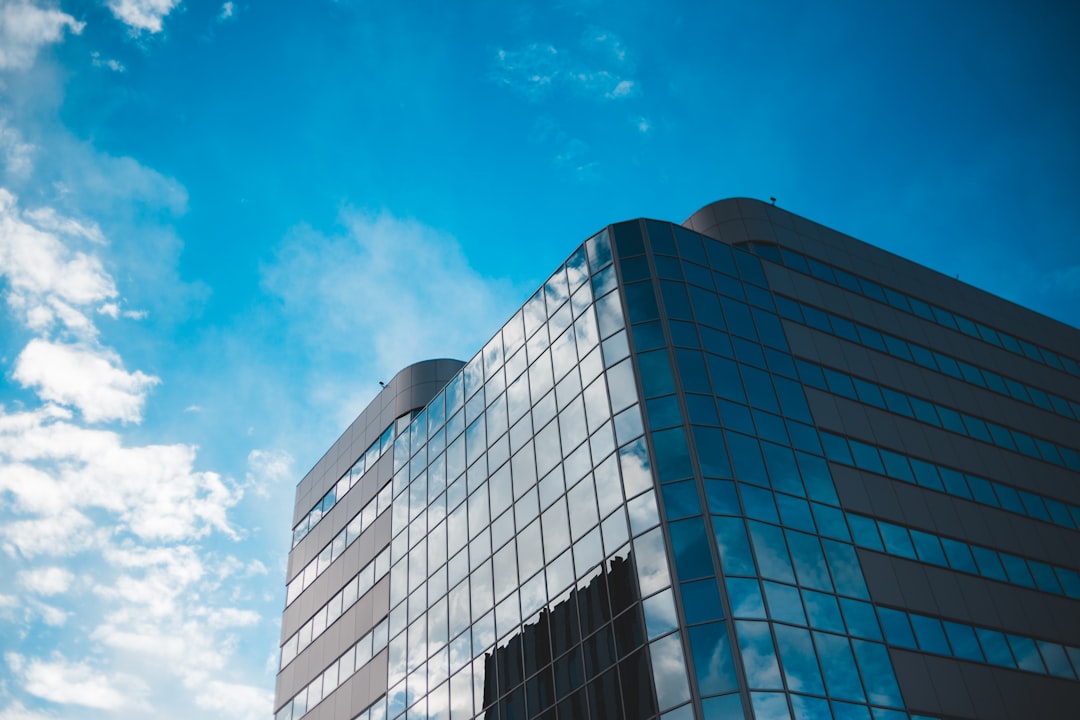 gray concrete building under blue sky during daytime