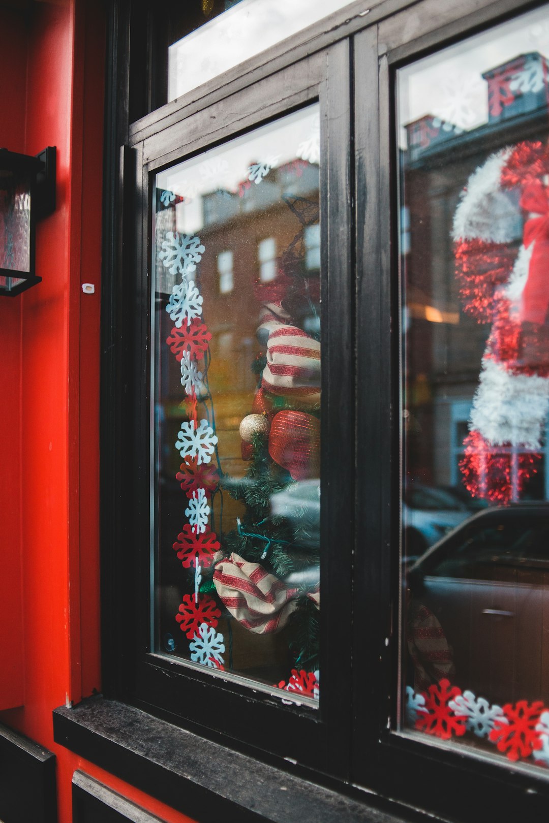 black wooden framed glass window