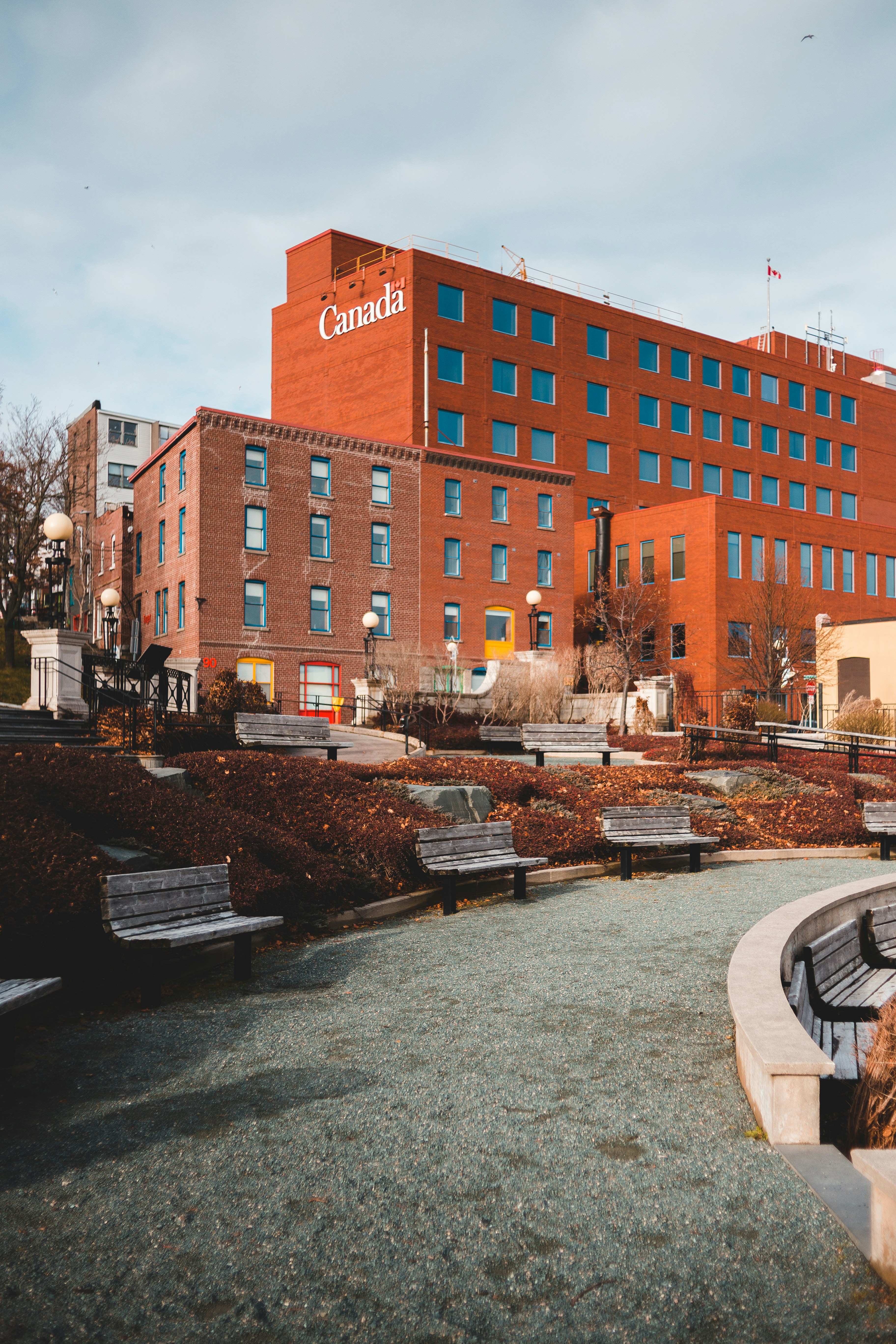 brown concrete building near brown concrete building during daytime