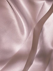 Elegant women's formal dress fabric with subtle sheen.