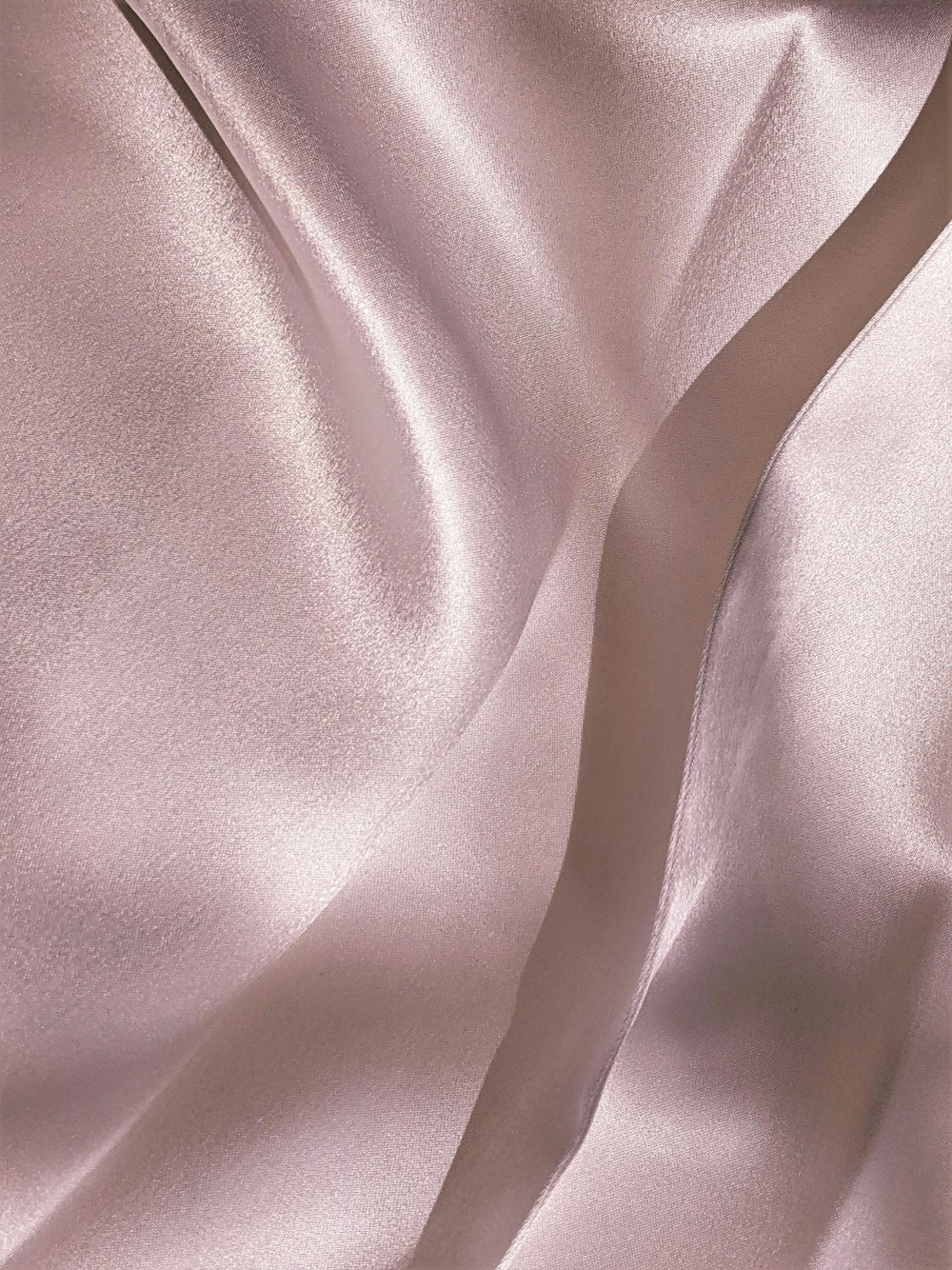 gray textile on brown wooden table