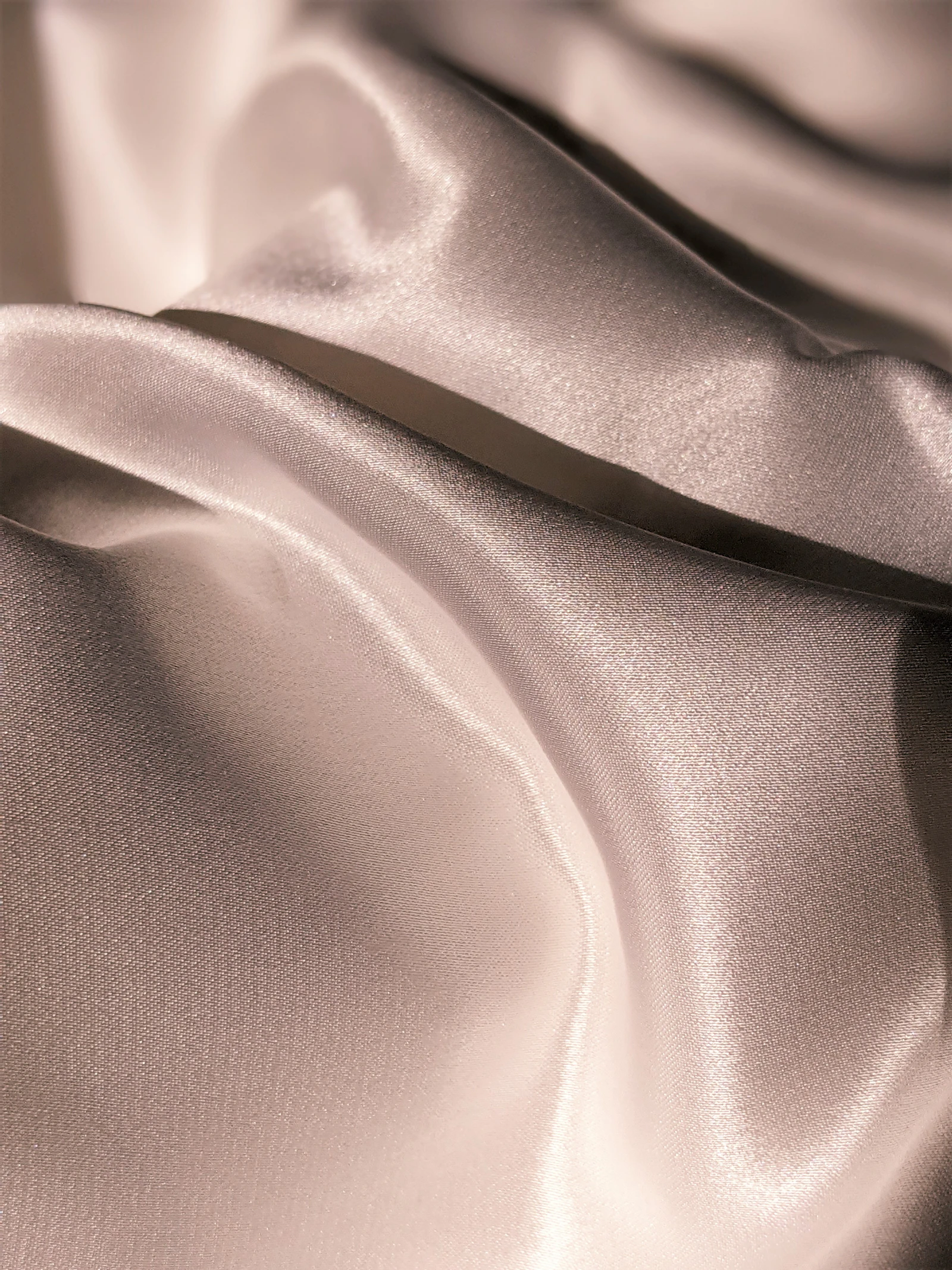 Close detail of the satin eye mask