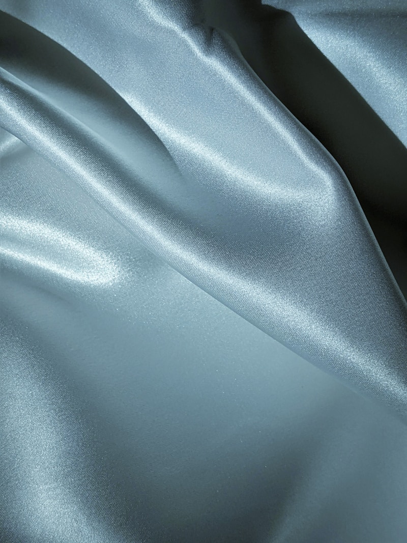 Close-up of woven textile fibers with metallic thread