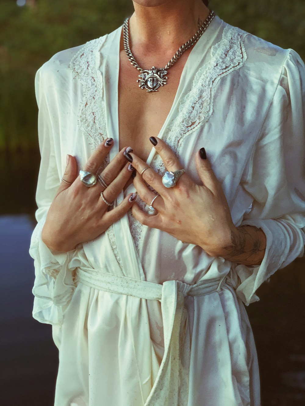woman in white dress wearing silver bracelet