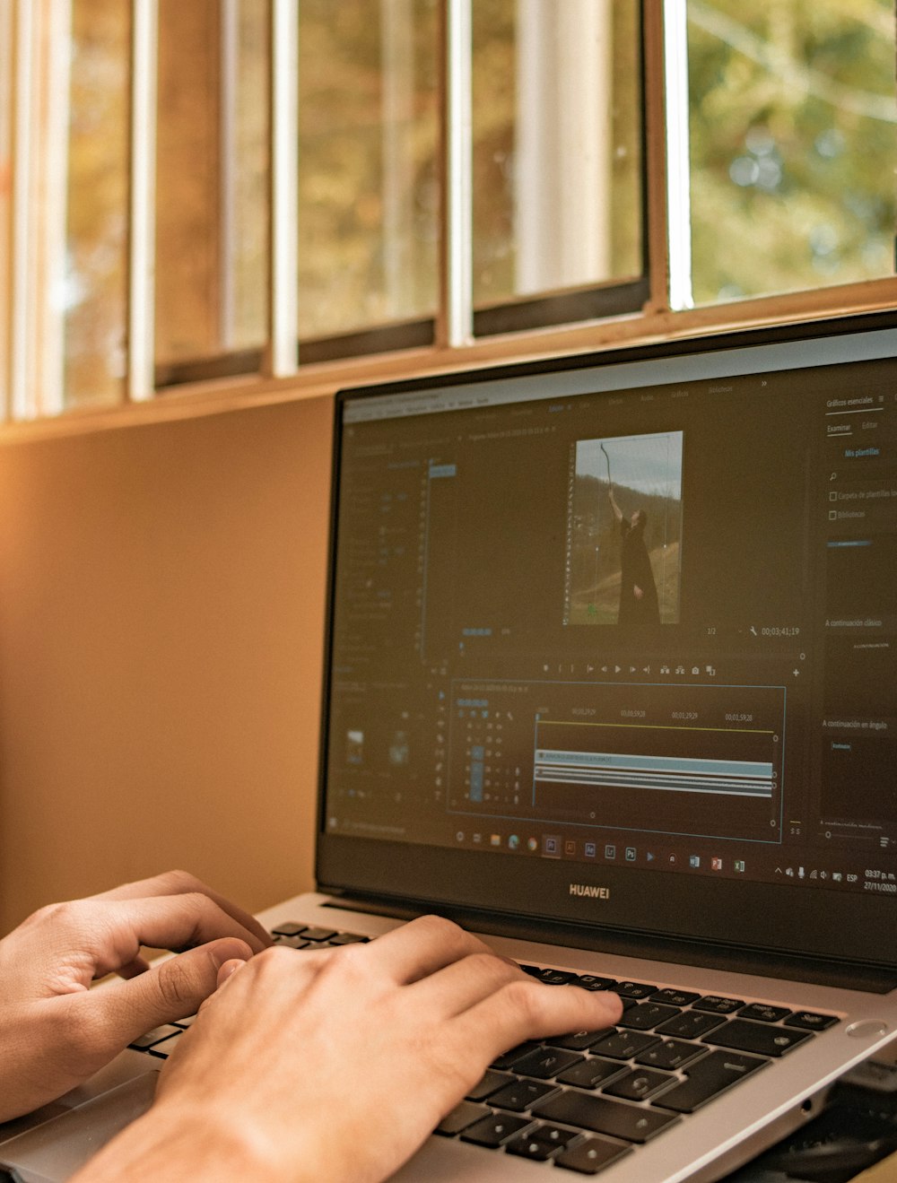 person using black laptop computer