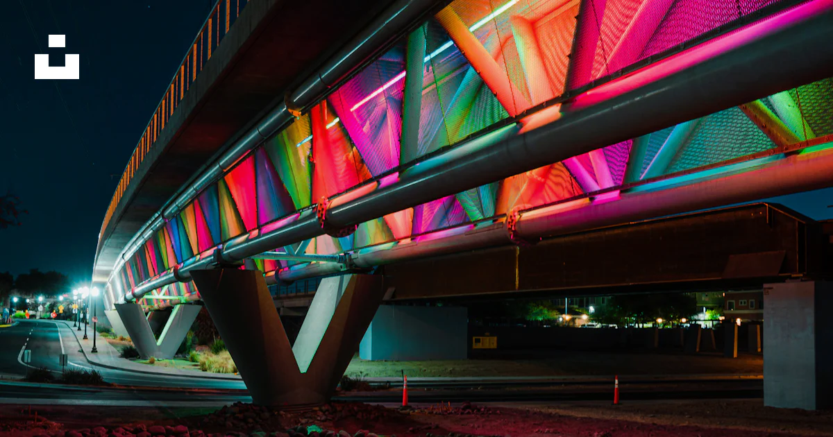 Red and green lighted bridge during night time photo – Free Night Image ...