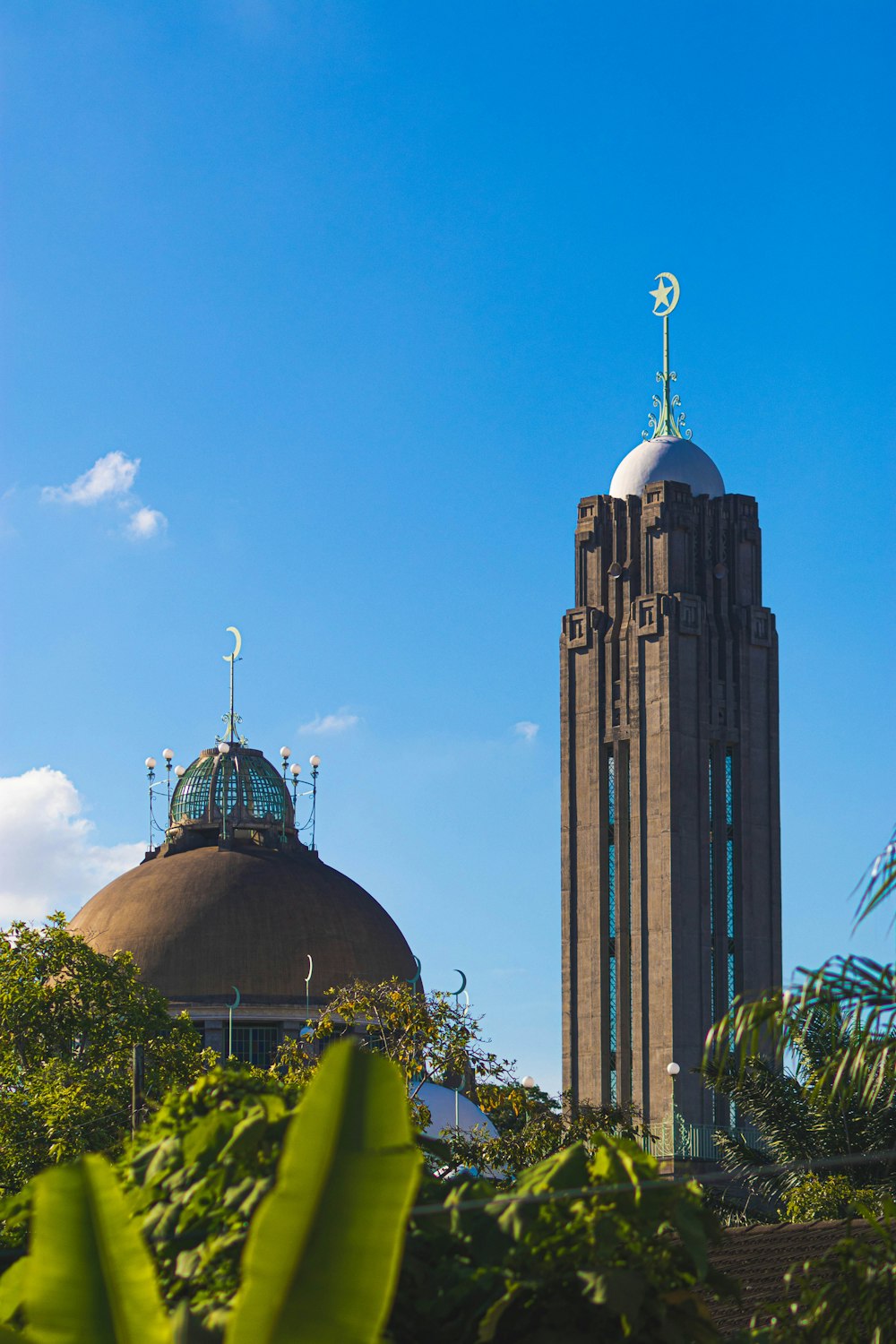 brown concrete building under blue sky during daytime