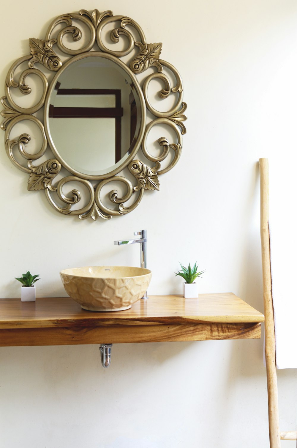 brown wooden vanity table with mirror