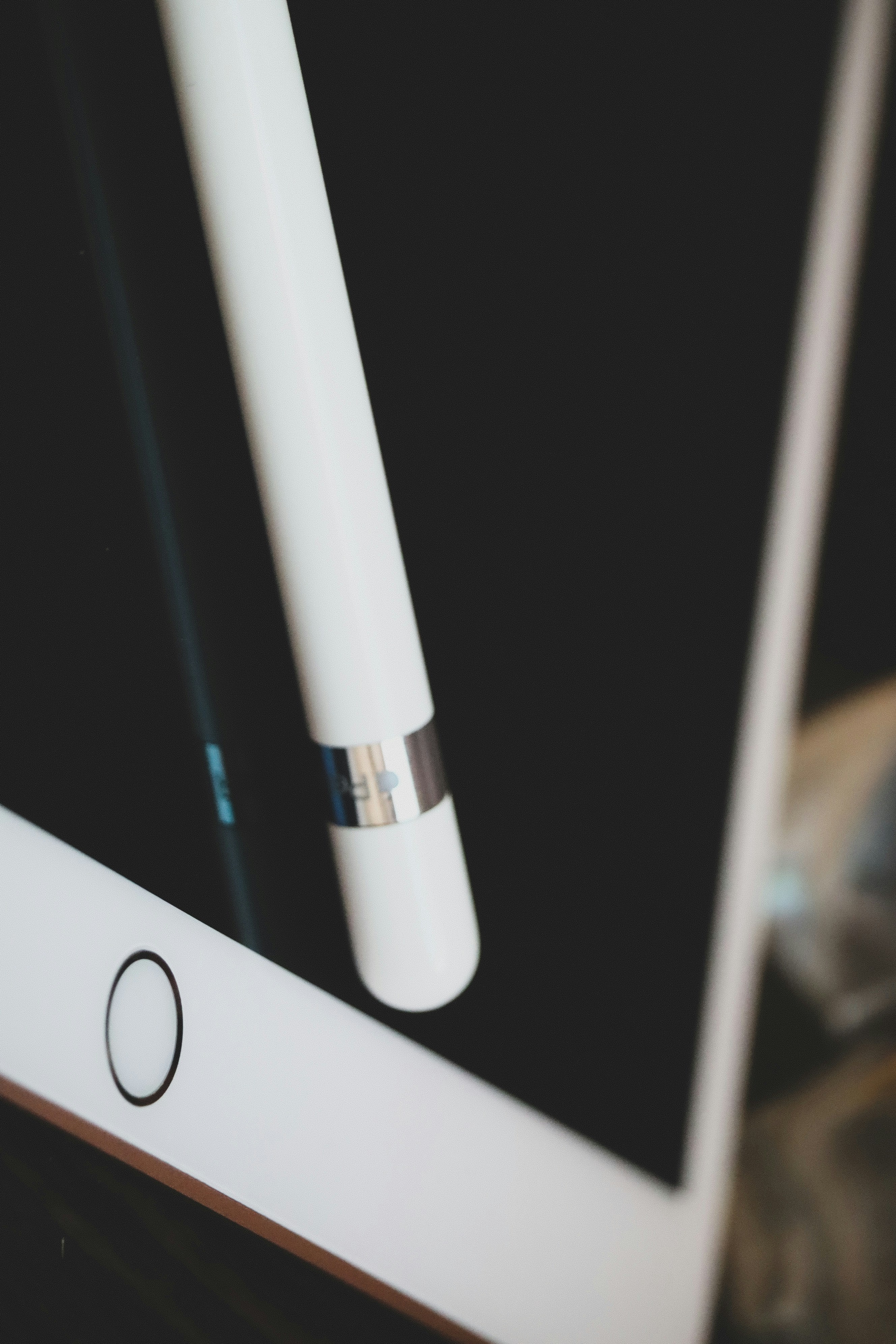 Tablet on white background, bright studio lighting